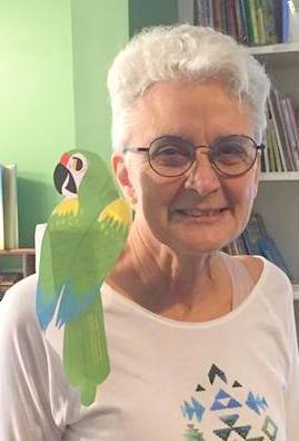 Author with paper parrot on her shoulder