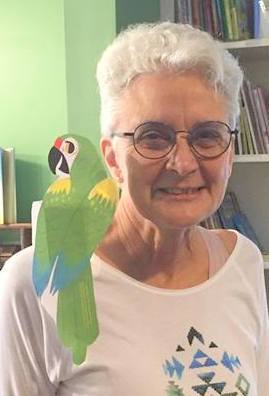 Author with paper parrot on her shoulder